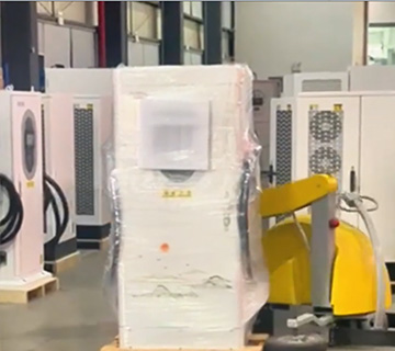 Automatic Protective Packaging for EV Chargers Automatic packing machine applying customized protective packaging to EV chargers, ensuring dustproof and moisture-proof protection before shipping.
