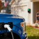 Home EV charging setup comparing Level 1 and Level 2 chargers