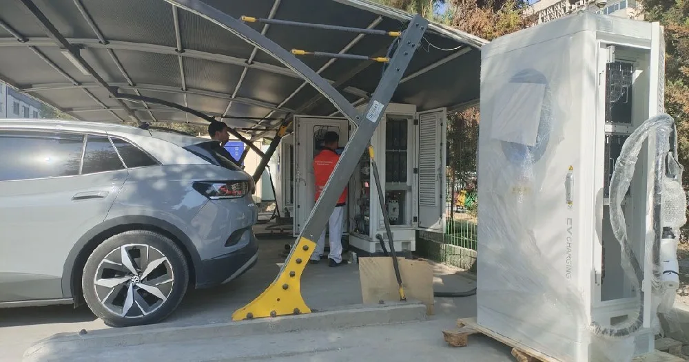 180kW-240kW DC dual-gun EV charging station installed in a commercial parking lot in Uzbekistan.