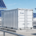 AnengJi containerized energy storage system installed in an industrial facility for peak shaving.