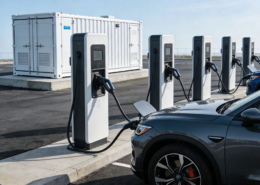 A commercial EV charging energy storage system integrated with DC fast chargers at a highway rest stop.