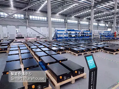 Battery energy storage system components stored in an intelligent warehouse for efficient BESS production and supply chain management