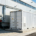 A behind-the-meter battery energy storage system (BESS) installed at an industrial manufacturing plant for peak shaving.