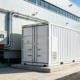 A behind-the-meter battery energy storage system (BESS) installed at an industrial manufacturing plant for peak shaving.