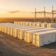 A utility scale stationary battery storage plant featuring industrial energy storage containers for grid stability.
