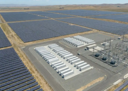 A massive front of the meter 100MW utility scale battery storage project installed at a regional substation grid terminal.