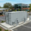 A turnkey 1MW battery storage system for EV charging stations installed at a commercial distribution site to provide peak shaving.