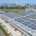 Scalable commercial turnkey solar solutions for businesses operating on a modern logistics center rooftop.