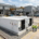 High-capacity industrial bess containerized system installed next to a manufacturing plant for energy cost reduction.
