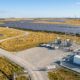 An agrivoltaics installation featuring commercial solar panels paired with safe grid-scale energy storage to mitigate performance risks.