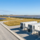 A side-by-side comparison of a 10ft, 20ft, and 40ft Container BESS fleet installed on concrete pads at a utility solar farm.