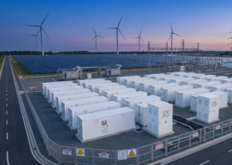 Large scale containerized battery storage system installation designed by a global BESS manufacturer near an industrial solar PV farm