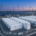 Large scale containerized battery storage system installation designed by a global BESS manufacturer near an industrial solar PV farm