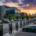 A clean commercial parking lot with a row of high-power DC fast charging stations