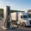 High-power truck EV charging infrastructure charging Class 8 electric semi-trucks at a modern freight depot.