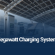 High power Megawatt Charging System charging a heavy-duty electric truck at a modern highway logistics hub.