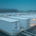 A grid-scale battery energy storage system facility manufactured in Germany during blue hour