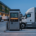High-power commercial EV charger delivering rapid DC fast charging to an electric logistics van at a European fleet depot.