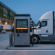High-power commercial EV charger delivering rapid DC fast charging to an electric logistics van at a European fleet depot.