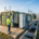 Engineer inspecting liquid-cooled battery racks inside a 5MWh BESS container
